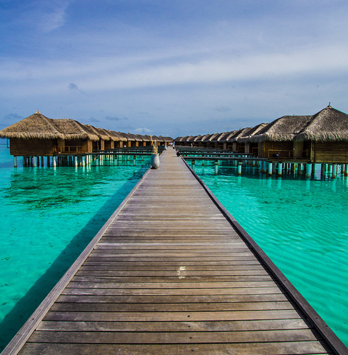 Overwater villas in a tropical island destination